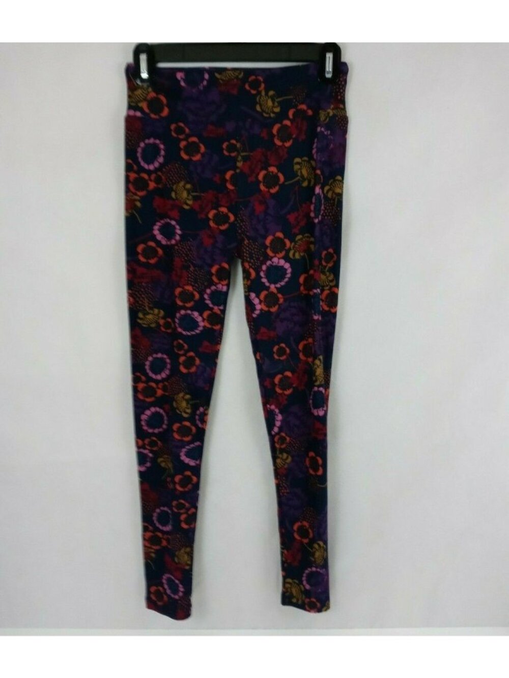 New LuLaRoe One Size Leggings With Multi-Color Sunflower Design On Dark Blue